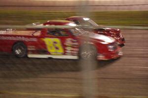 Andy Jirik’s Chevy and Jerry Wood’s Chevy come side-by-side out of turn 4 on the final lap