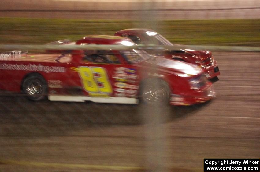 Andy Jirik’s Chevy and Jerry Wood’s Chevy come side-by-side out of turn 4 on the final lap