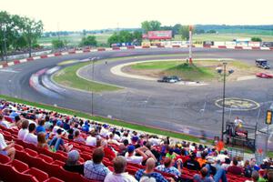 Fans watching cars through turns 3 and 4