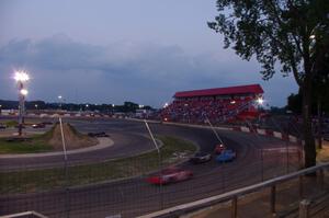 The field stays behind the pace car on a pace lap.