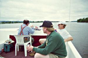 L to R) ???, Kurt Ristow and Dan Naniga relax on the upper deck