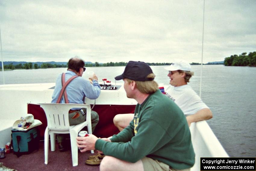 L to R) ???, Kurt Ristow and Dan Naniga relax on the upper deck