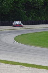 Jason Leffler's Chevy Impala in the gravel trap on the outside of the carousel