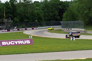 Max Papis' Chevy Impala and Doug Harrington's Ford Mustang at the kink