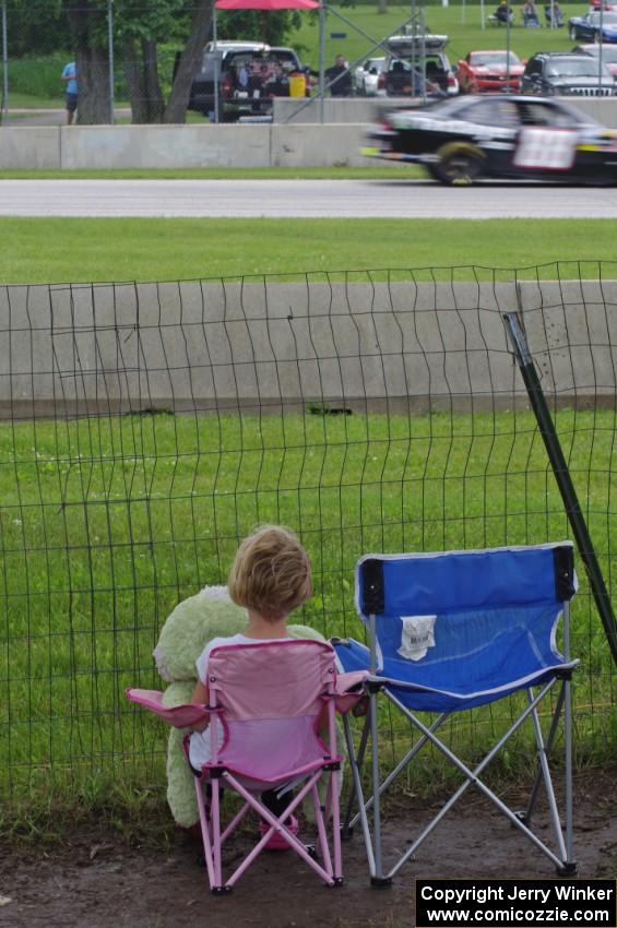 Aric Almirola's Chevy Impala goes past at turn three