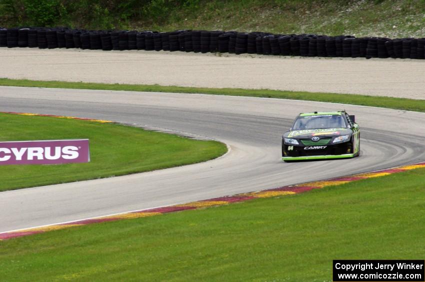 Jason Bowles' Toyota Camry exits the carousel