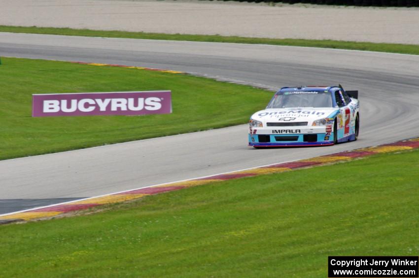 Elliott Sadler's Chevy Impala exits the carousel