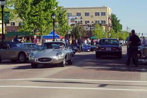 Main street of Osseo, MN with a Jaguar XKE readying to get into position