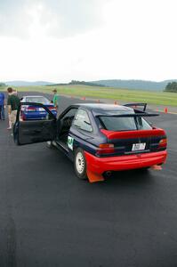 The Chris Sanborn / Chris Stark Ford Escort Cosworth awaits tech.