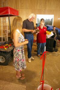 Miss Wellsboro 2007 helps Al Kintigh and Beryl Ann Burton with the seeded draw.