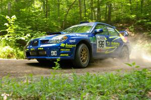 The Travis Pastrana / Christian Edstrom Subaru WRX STi settled into second on the road.