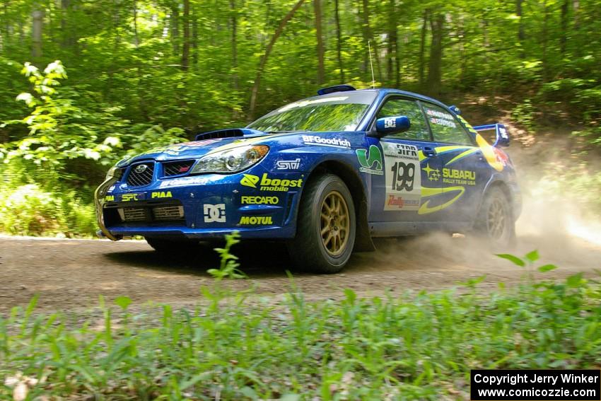 The Travis Pastrana / Christian Edstrom Subaru WRX STi settled into second on the road.