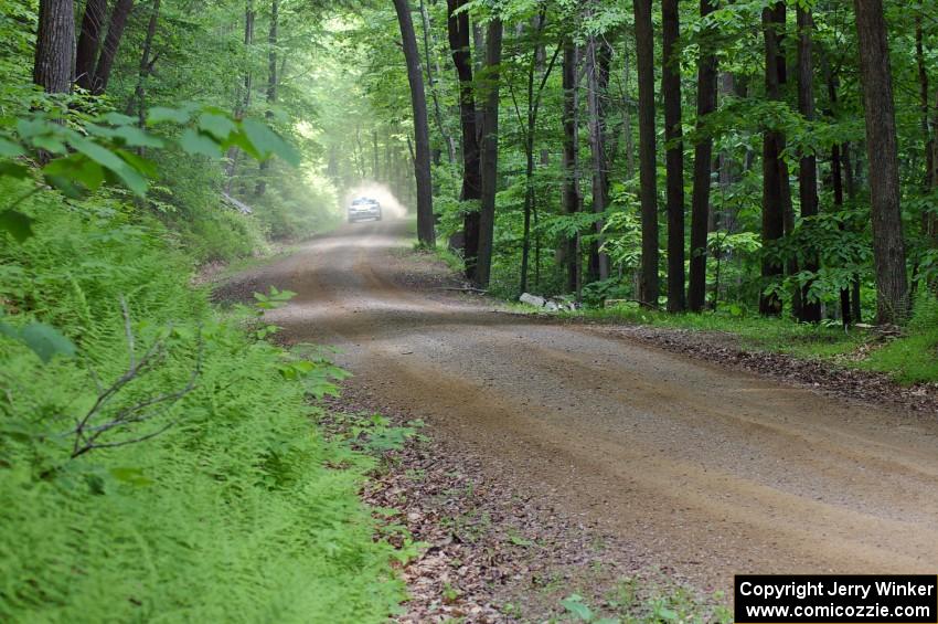 The Paul Choiniere / Jeff Becker Hyundai Tiburon rockets down a straight on SS3.