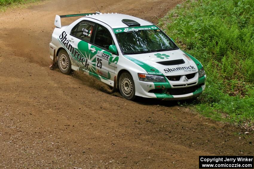 The Seamus Burke / Eddie Fries Mitsubishi Lancer Evo 9 does a bit of ditch-hooking at a hairpin on SS9.