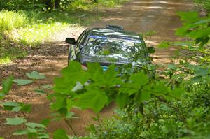 Jonathan Bottoms / Carolyn Bosley Subaru WRX STi blasts out of a hairpin on SS3.