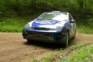 Kyle Sarasin / Mikael Johansson	Ford Focus SVT at a hairpin on SS3.