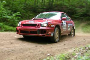 Bryan Pepp / Jerry Stang Subaru WRX at a hairpin on SS3.