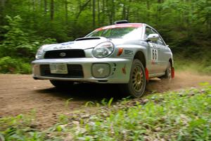 Ted Mendham / Lise Mendham Subaru WRX at a hairpin on SS3.