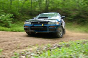 Don Kennedy / Keith Kennedy Subaru Impreza at a hairpin on SS3.