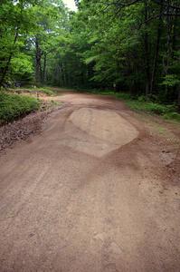 The Seamus Burke / Eddie Fries Mitsubishi Lancer Evo 9 went straight at a 90-right accidentally.