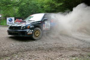 Pat Moro / Mike Rossey Subaru WRX at a hairpin on SS6.