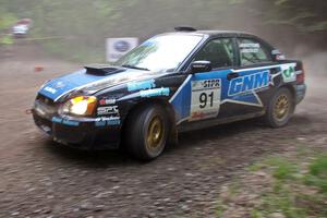 Jonathan Bottoms / Carolyn Bosley Subaru WRX STi limps through a hairpin on SS6.