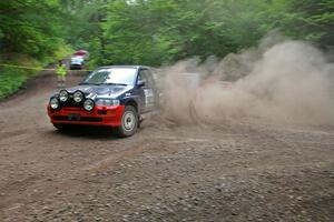 Chris Sanborn / Chris Stark Ford Escort Cosworth goes wide at a hairpin on SS6.