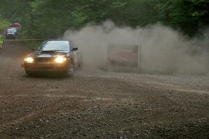 Don Kennedy / Keith Kennedy Subaru Impreza gets wide on SS6.