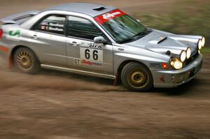 Ted Mendham / Lise Mendham Subaru WRX at a hairpin on SS6.