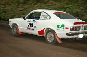 The Philip Lynch / Conner Skeffington Mazda RX-3 his the gas coming out of a hairpin on SS6.