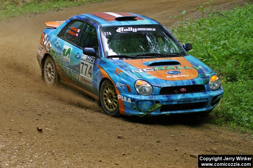 The Otis Dimiters / Alan Ockwell Subaru WRX STi on SS3.