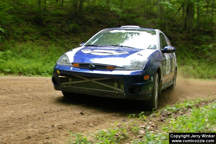 Kyle Sarasin / Mikael Johansson	Ford Focus SVT at a hairpin on SS3.