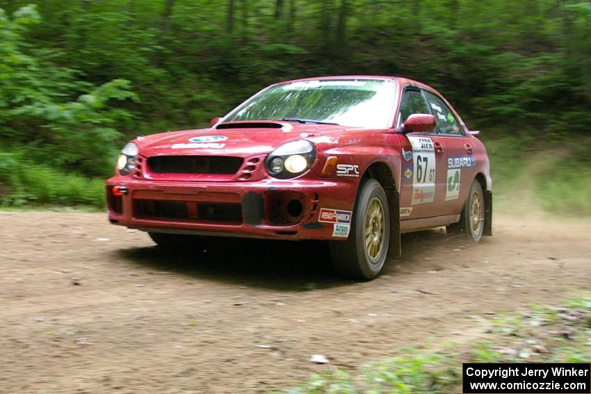 Bryan Pepp / Jerry Stang Subaru WRX at a hairpin on SS3.
