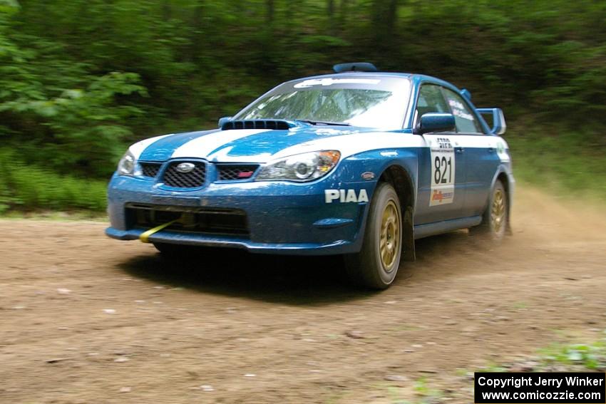 Bob Wall / Chad Edmunds Subaru WRX STi at a hairpin on SS3.