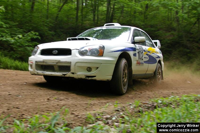 George Georgakopoulos / Faruq Mays Subaru WRX at a hairpin on SS3.