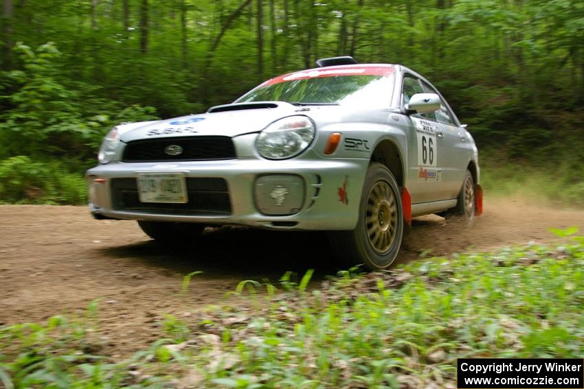 Ted Mendham / Lise Mendham Subaru WRX at a hairpin on SS3.