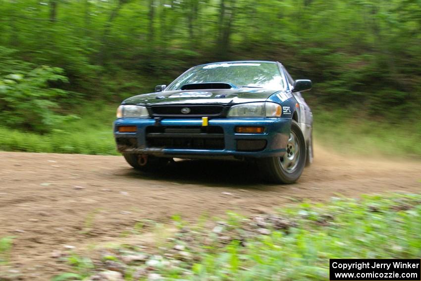 Don Kennedy / Keith Kennedy Subaru Impreza at a hairpin on SS3.