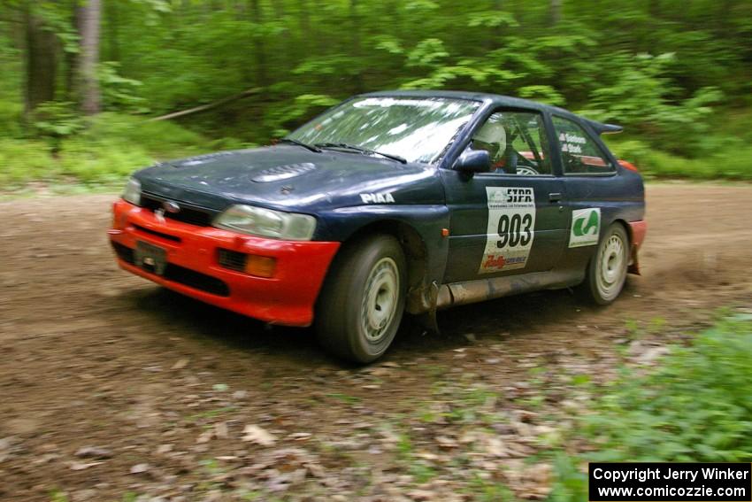 Chris Sanborn / Chris Stark Ford Escort Cosworth at a hairpin on SS3.