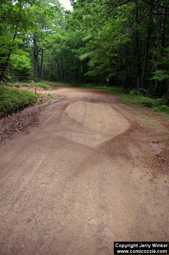 The Seamus Burke / Eddie Fries Mitsubishi Lancer Evo 9 went straight at a 90-right accidentally.