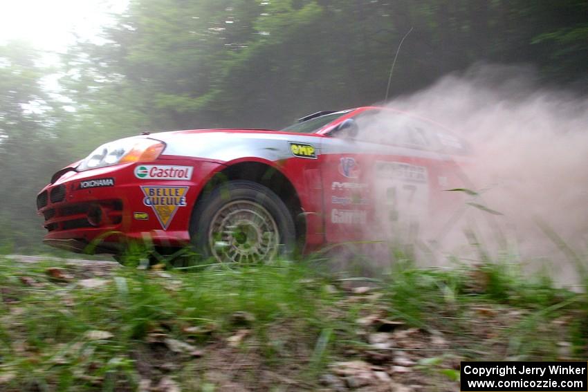 Antoine L'Estage / Nathalie Richard Hyundai Tiburon on SS6. They retired at the end of the stage with a damaged suspension.