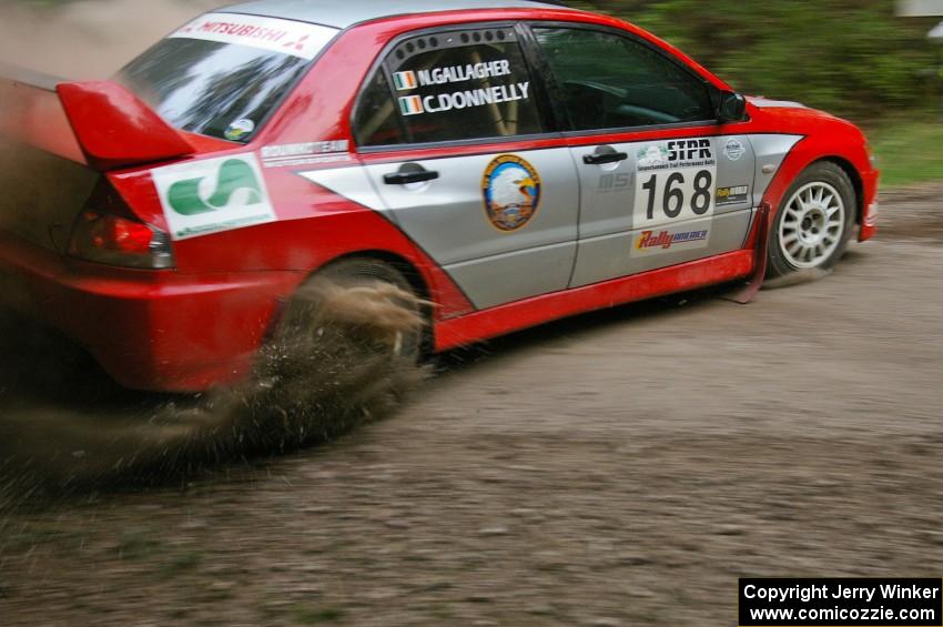 Celsus Donnelly / Noel Gallagher Mitsubishi Lancer Evo 8 almost put the car off the road at a hairpin on SS6.