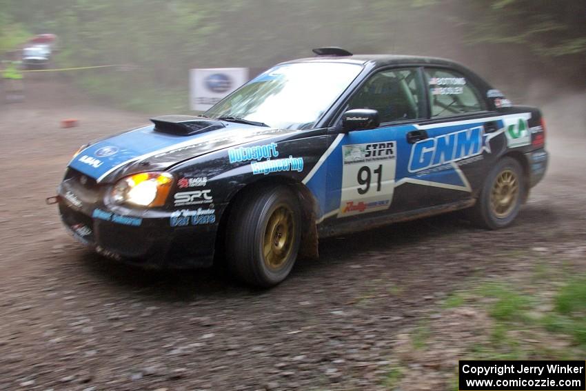 Jonathan Bottoms / Carolyn Bosley Subaru WRX STi limps through a hairpin on SS6.