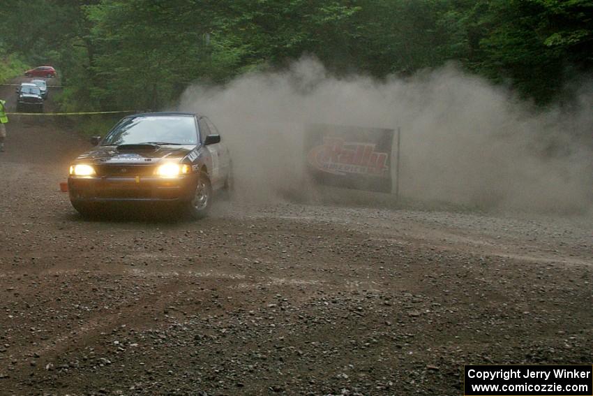 Don Kennedy / Keith Kennedy Subaru Impreza gets wide on SS6.