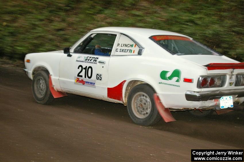 The Philip Lynch / Conner Skeffington Mazda RX-3 his the gas coming out of a hairpin on SS6.