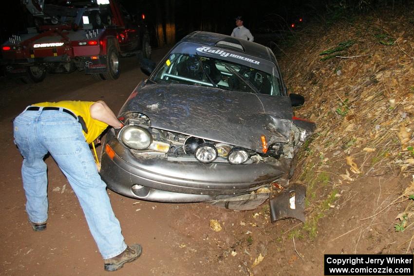 Colin Bombara / Rob Pantzer Dodge Neon hit a tree head on which spun the car across the road facing traffic.