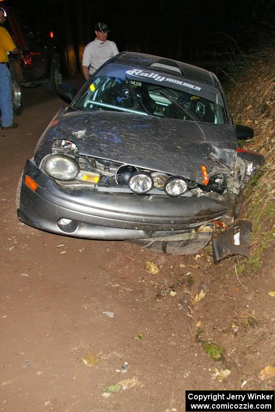 Colin Bombara / Rob Pantzer Dodge Neon hit a tree head on which spun the car across the road facing traffic.