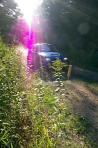 Dmitri Kishkarev / Hugh Hutchinson Mitsubishi Lancer Evo 4 on the practice stage.