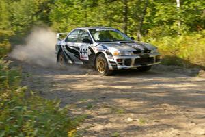 Jeff Moyle / Michael Yarroch Subaru Impreza blasts into a right-hander on the practice stage.