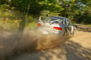 Jeff Moyle / Michael Yarroch Subaru Impreza blasts out of a right-hander on the practice stage.