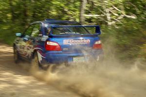 Kenny Bartram / Dennis Hotson Subaru WRX STi rockets down a straight near the flying finish of the press stage.